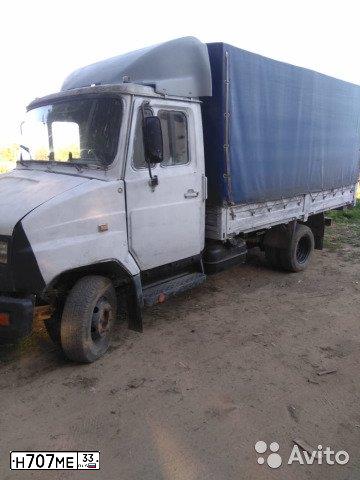Фото автомобиля SCANIA SERIE R /4X2/, 1999 — госномер Н410СА33. Цвет: СЕРЕБРИСТЫЙ