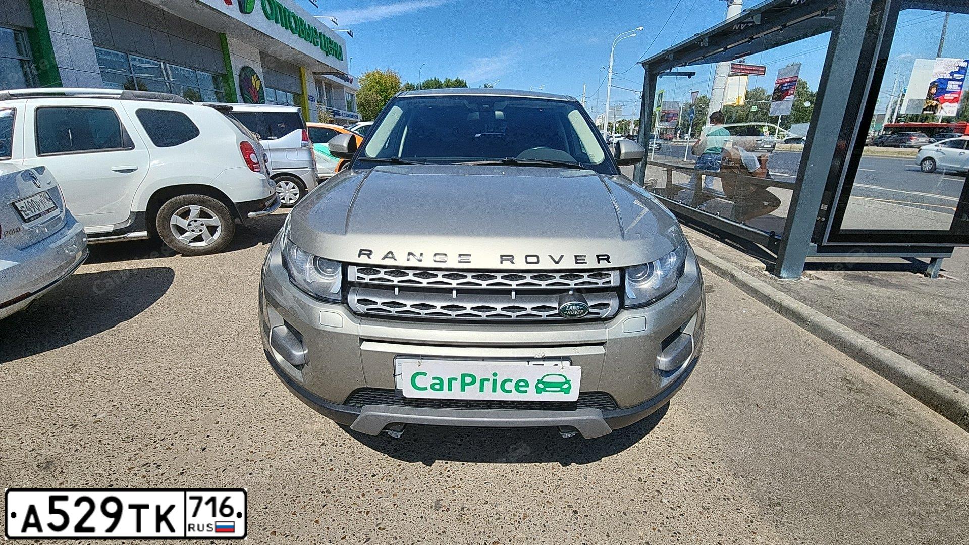 Фото автомобиля LANDROVER RANGE ROVER EVOQUE, 2014 — госномер Е553НХ51. Цвет: Серый