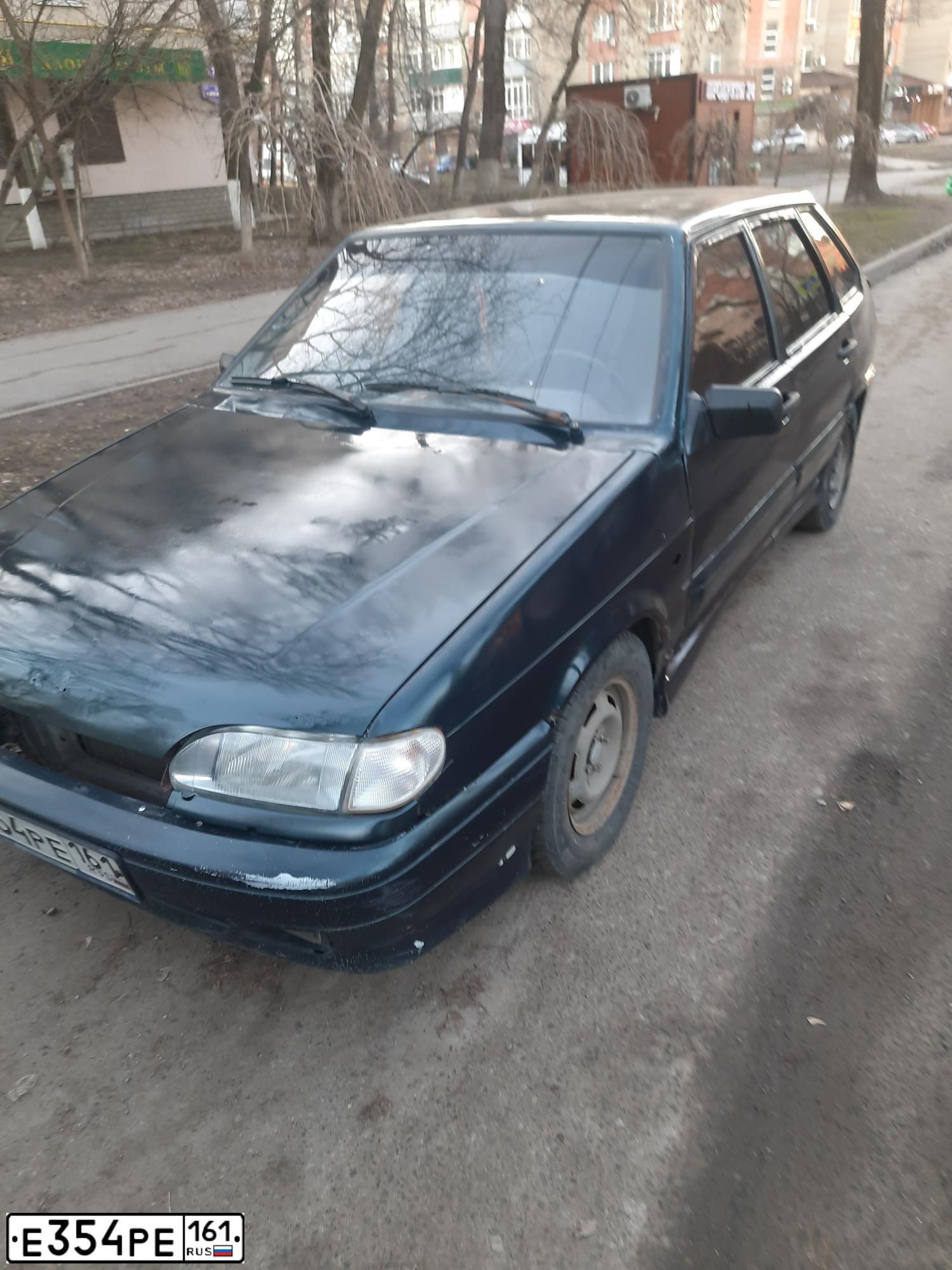 Фото автомобиля LADA 2114 SAMARA, 2008 — госномер Е354РЕ161. Цвет: ТЕМНО-ЗЕЛЕНЫЙ