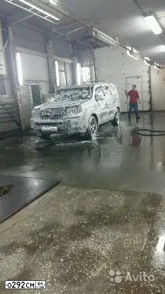 Фото автомобиля HONDA PILOT, 2008 — госномер О146СМ64. Цвет: СЕРЕБРИСТЫЙ