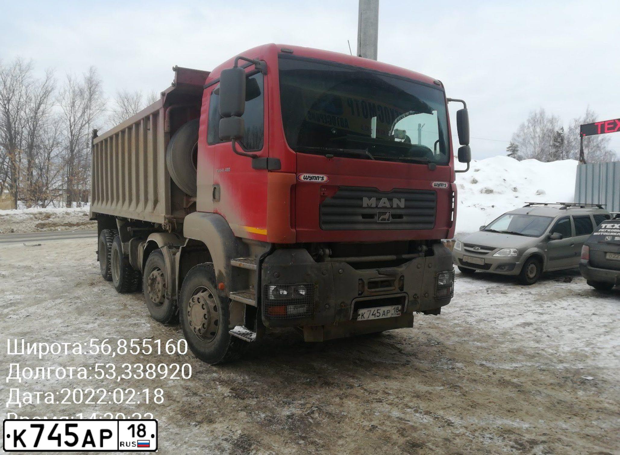 Фото автомобиля MAN TGA 41.XXX /8X4/, 2008 — госномер А335РХ159. Цвет: КРАСНЫЙ