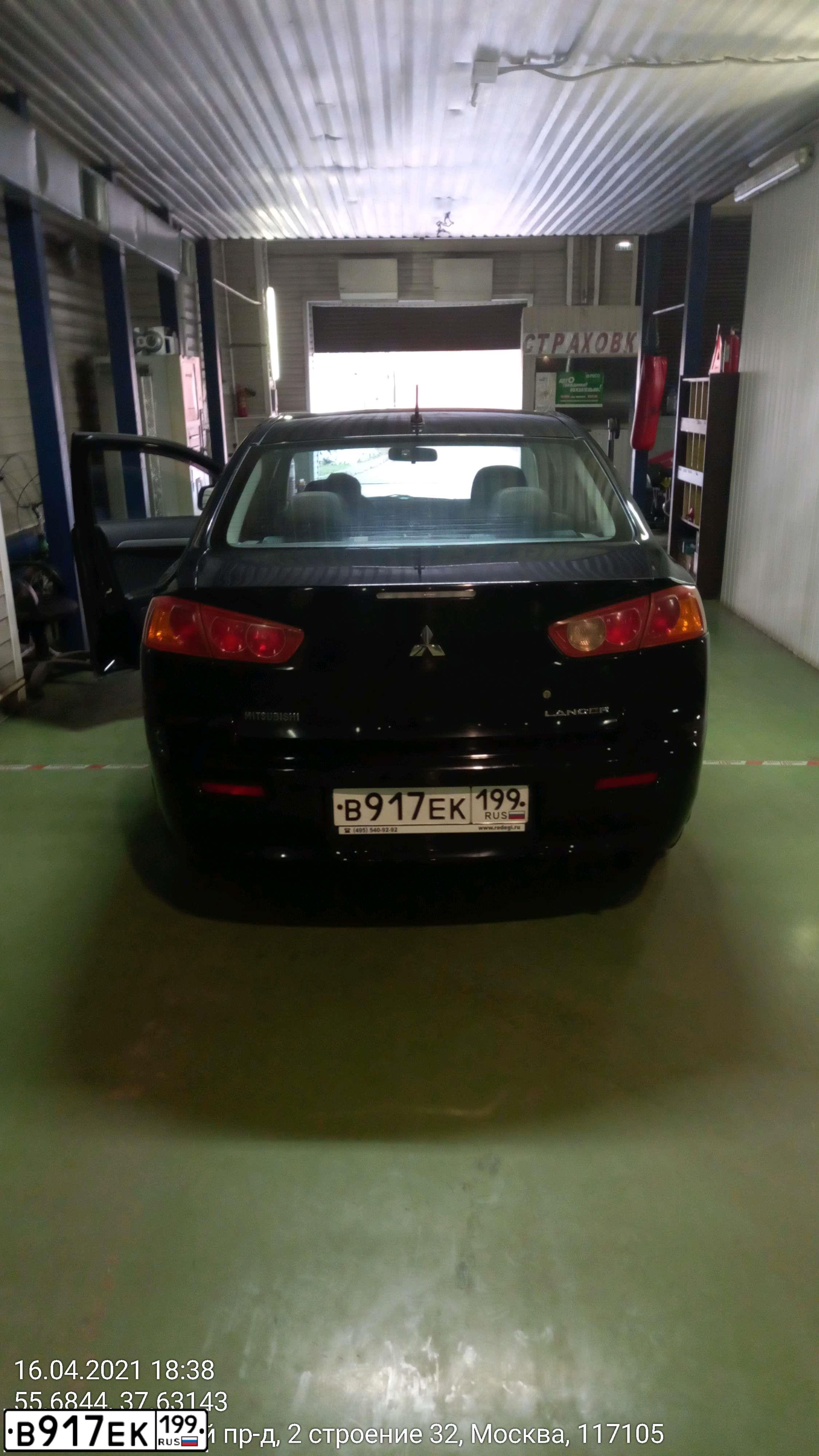 Фото автомобиля MITSUBISHI LANCER, 2008 — госномер В917ЕК199. Цвет: ЧЕРНЫЙ