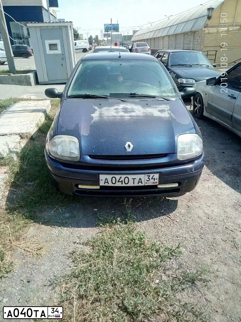 Фото автомобиля RENAULT CLIO, 2001 — госномер А040ТА34. Цвет: синий
