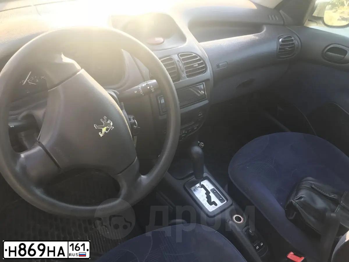 Фото автомобиля PEUGEOT 206, 2002 — госномер К361СН82. Цвет: Белый