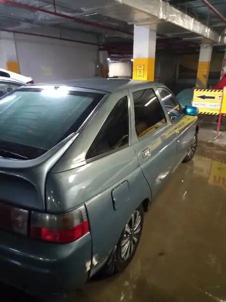 Фото автомобиля LADA 2112 LADA, 2000 — госномер В888СО702. Цвет: СЕРО-СИНИЙ