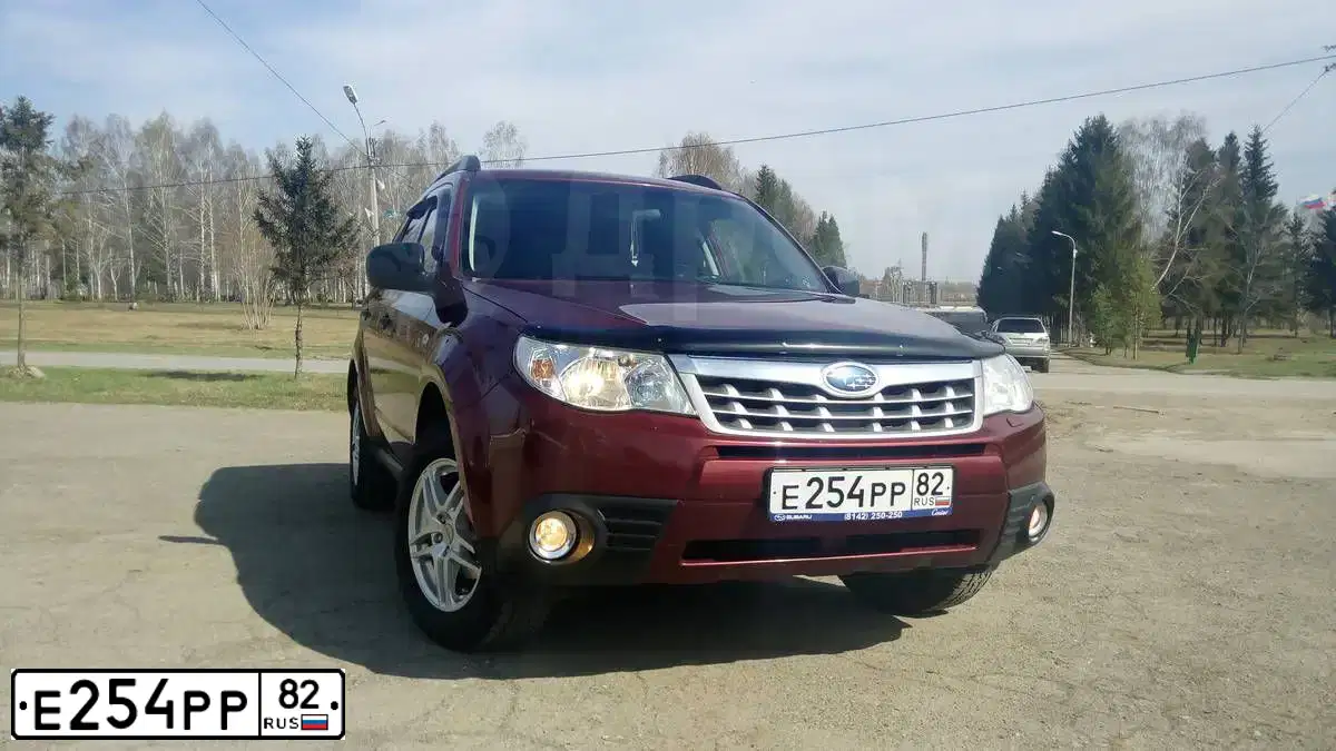 Фото автомобиля SUBARU FORESTER, 2011 — госномер К369ТТ10. Цвет: КРАСНЫЙ