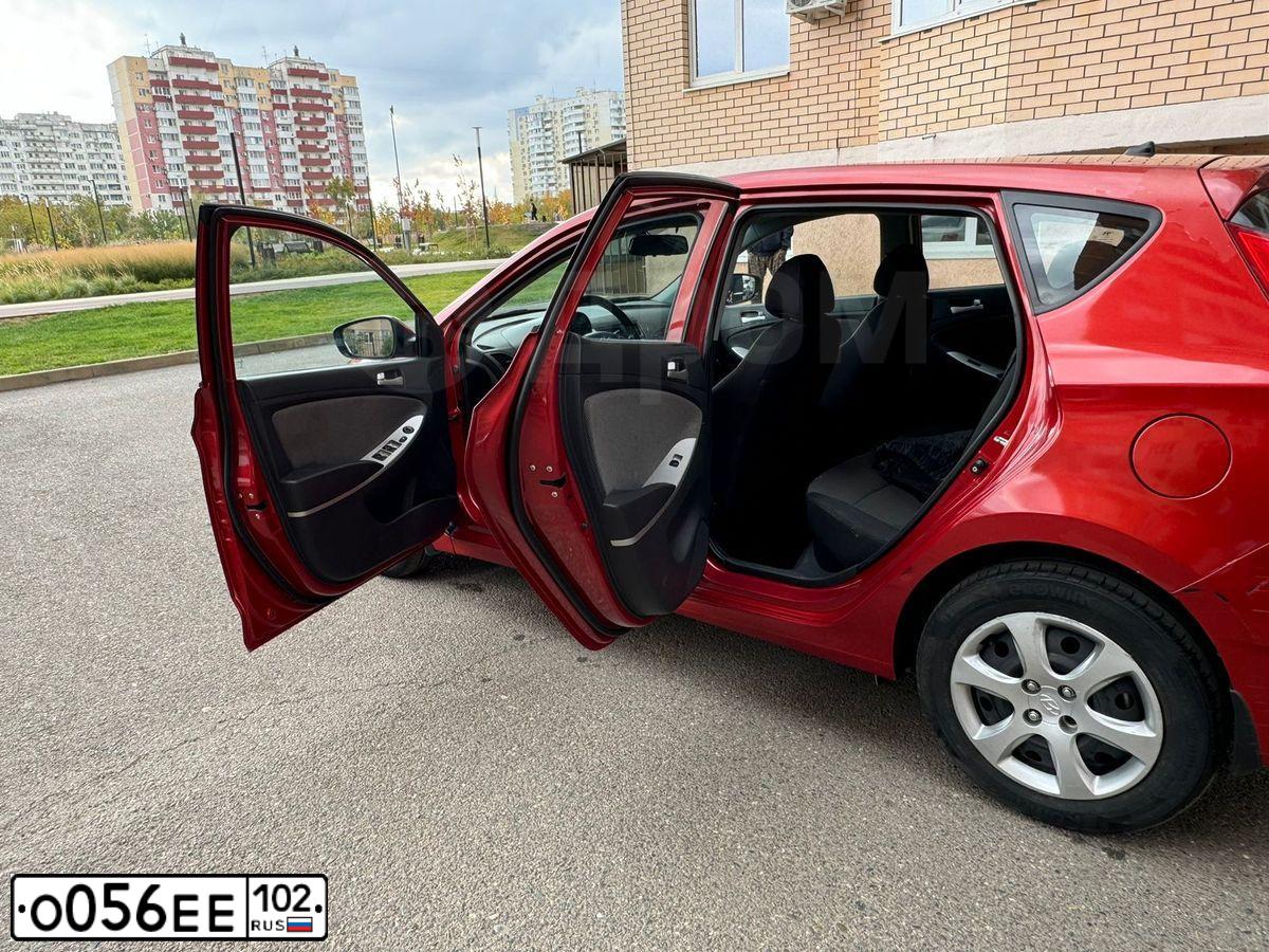 Фото автомобиля HYUNDAI SOLARIS, 2012 — госномер О056ЕЕ102. Цвет: КРАСНЫЙ ГРАНАТ