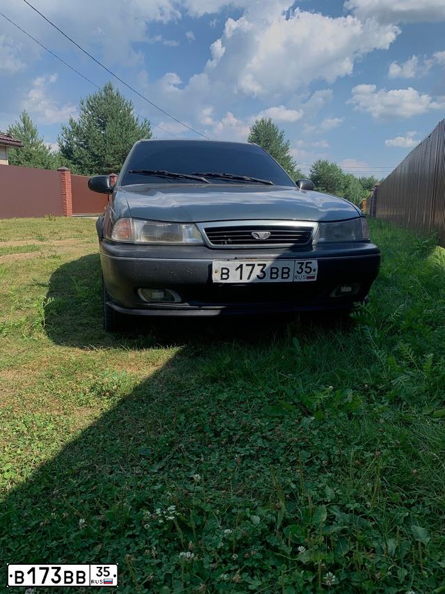 Фото автомобиля DAEWOO NEXIA, 1998 — госномер В173ВВ35. Цвет: СЕРО-ЗЕЛЕНЫЙ