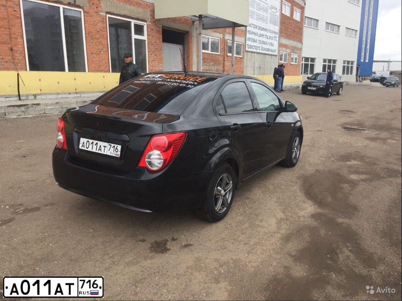 Фото автомобиля CHEVROLET AVEO, 2013 — госномер А011АТ716. Цвет: ЧЕРНЫЙ МЕТАЛЛИК