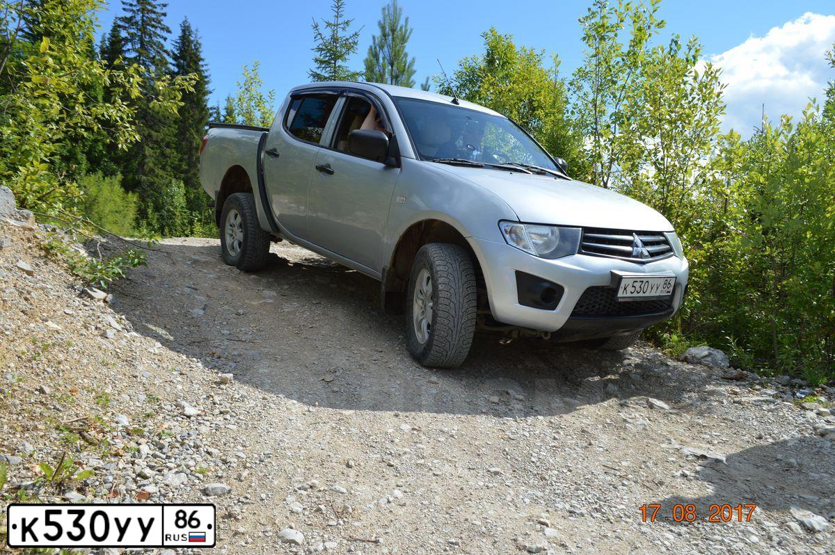 Фото автомобиля MITSUBISHI L200, 2011 — госномер А280ТО172. Цвет: СЕРЕБРИСТЫЙ
