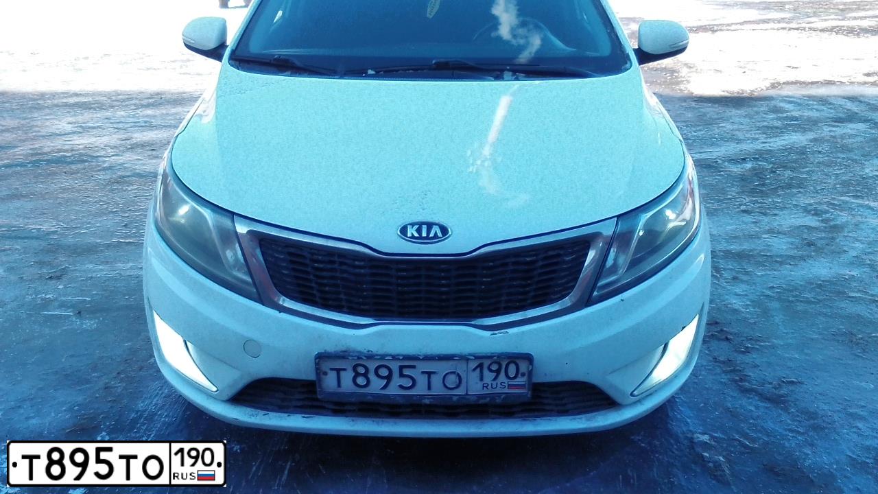 Фото автомобиля KIA RIO, 2012 — госномер О528СУ68. Цвет: Белый