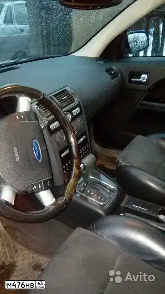 Фото автомобиля FORD MONDEO, 2006 — госномер О549ОТ01. Цвет: Серебристый