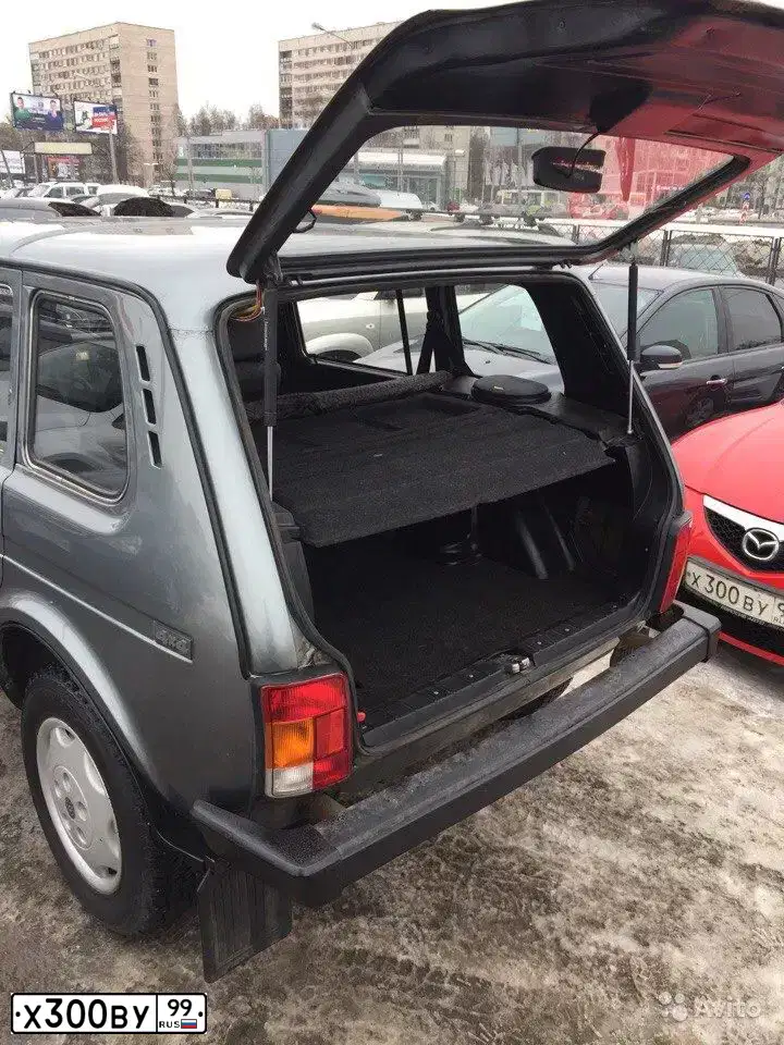 Фото автомобиля MITSUBISHI LANCER, 1998 — госномер К521ЕМ32. Цвет: ЗЕЛЕНЫЙ