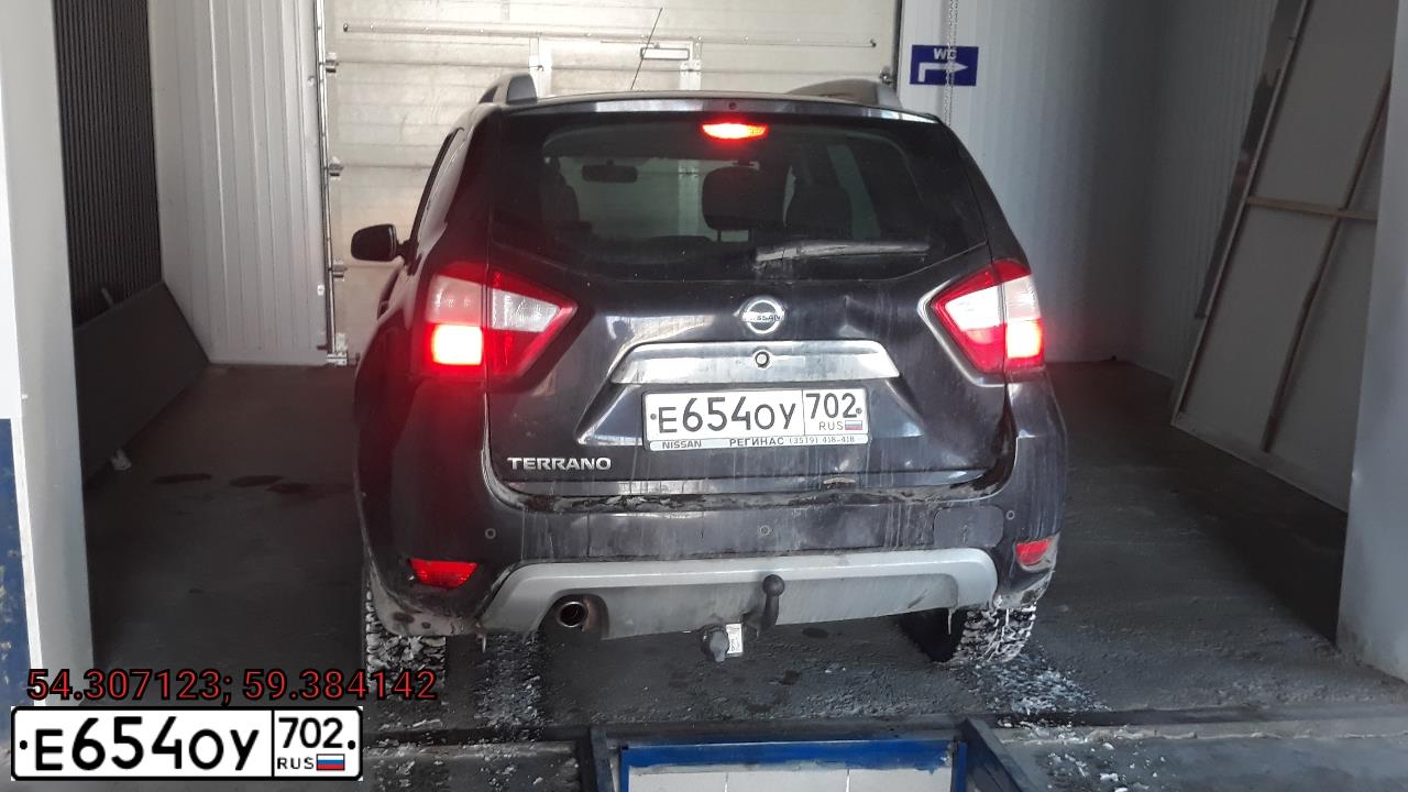 Фото автомобиля NISSAN TERRANO, 2015 — госномер Е654ОУ702. Цвет: ЧЕРНЫЙ