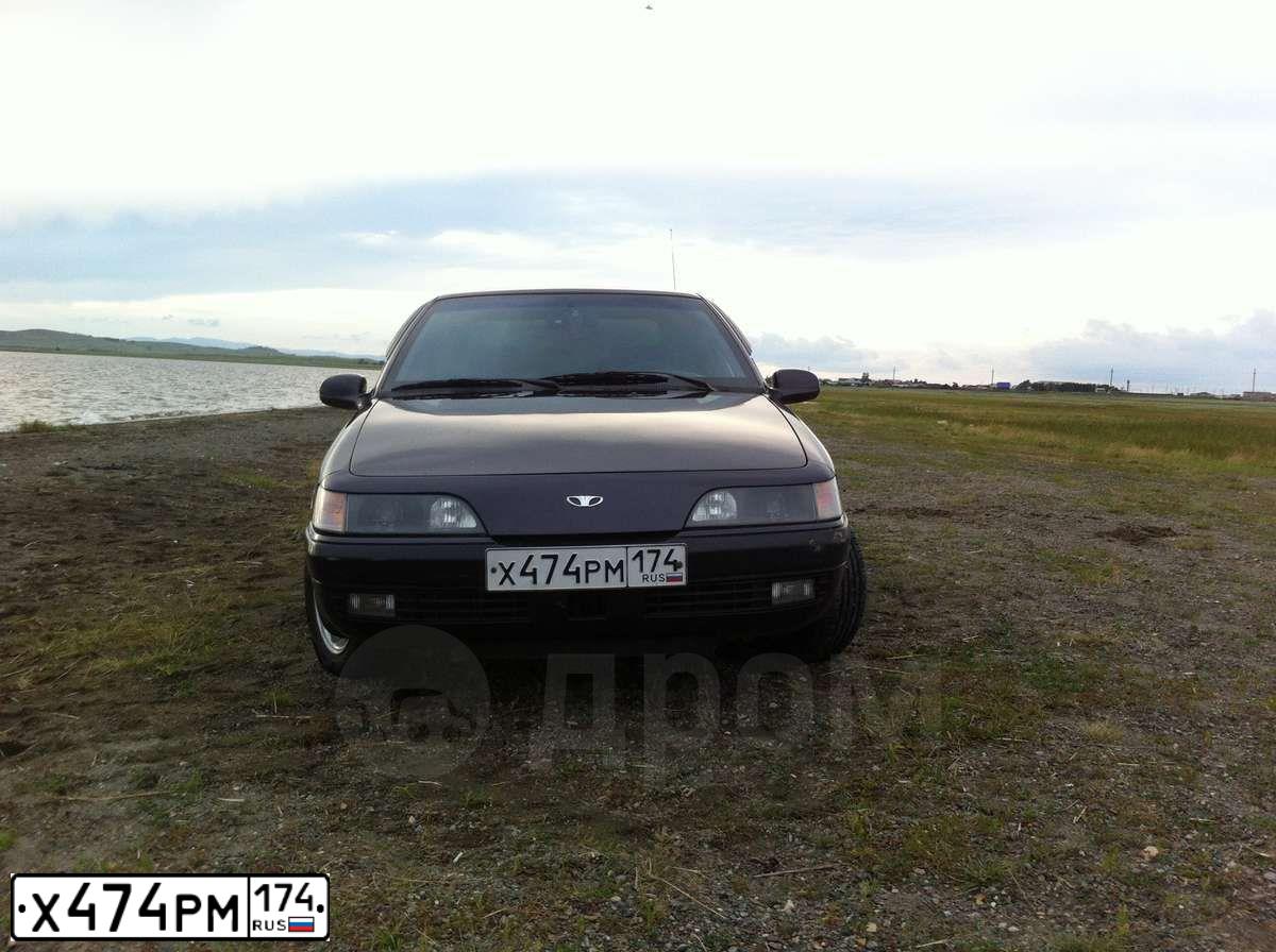 Фото автомобиля DAEWOO ESPERO, 1996 — госномер Х474РМ174. Цвет: ФИОЛЕТОВЫЙ