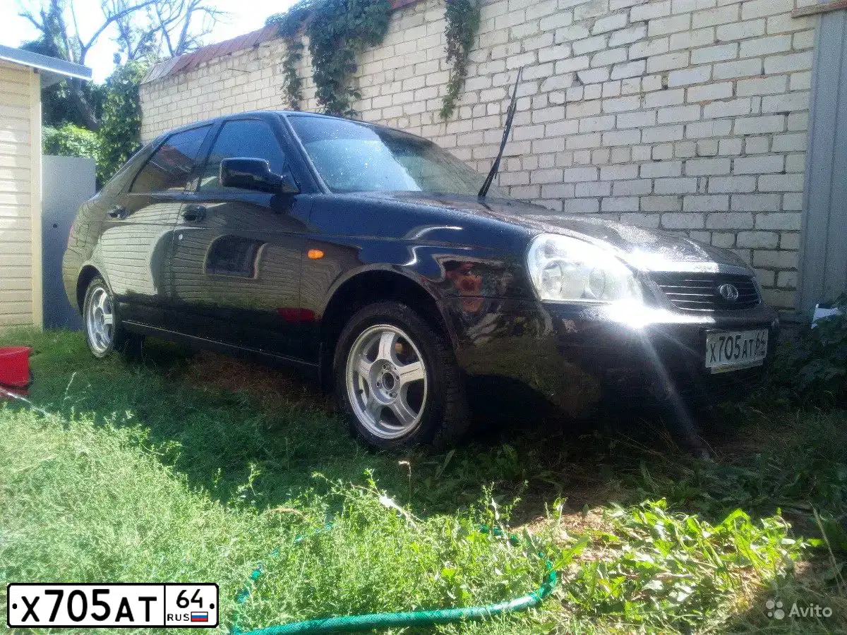 Фото автомобиля LADA 2172 PRIORA, 2009 — госномер Х705АТ64. Цвет: СИНЕ-ЧЕРНЫЙ