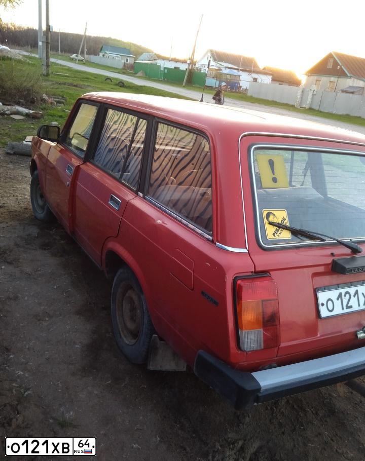Фото автомобиля LADA 2104, 1993 — госномер О121ХВ64. Цвет: КРАСНЫЙ