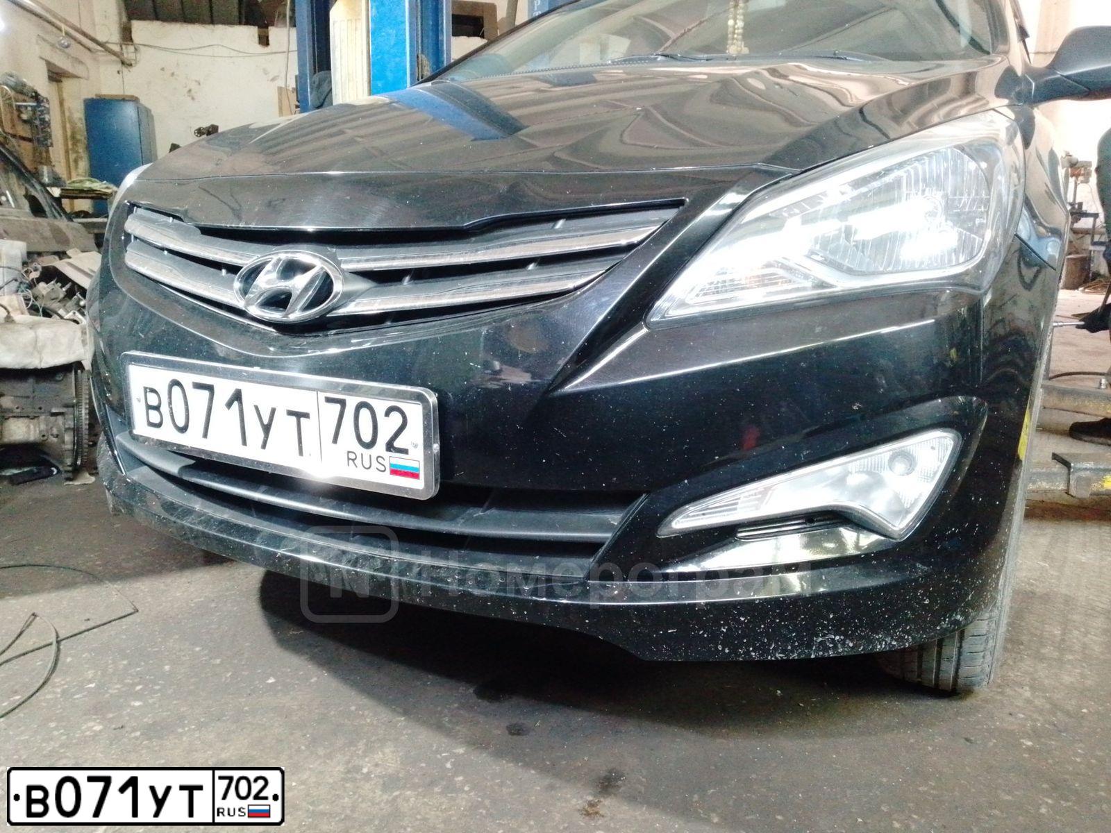 Фото автомобиля HYUNDAI SOLARIS, 2014 — госномер В071УТ702. Цвет: ЧЕРНЫЙ