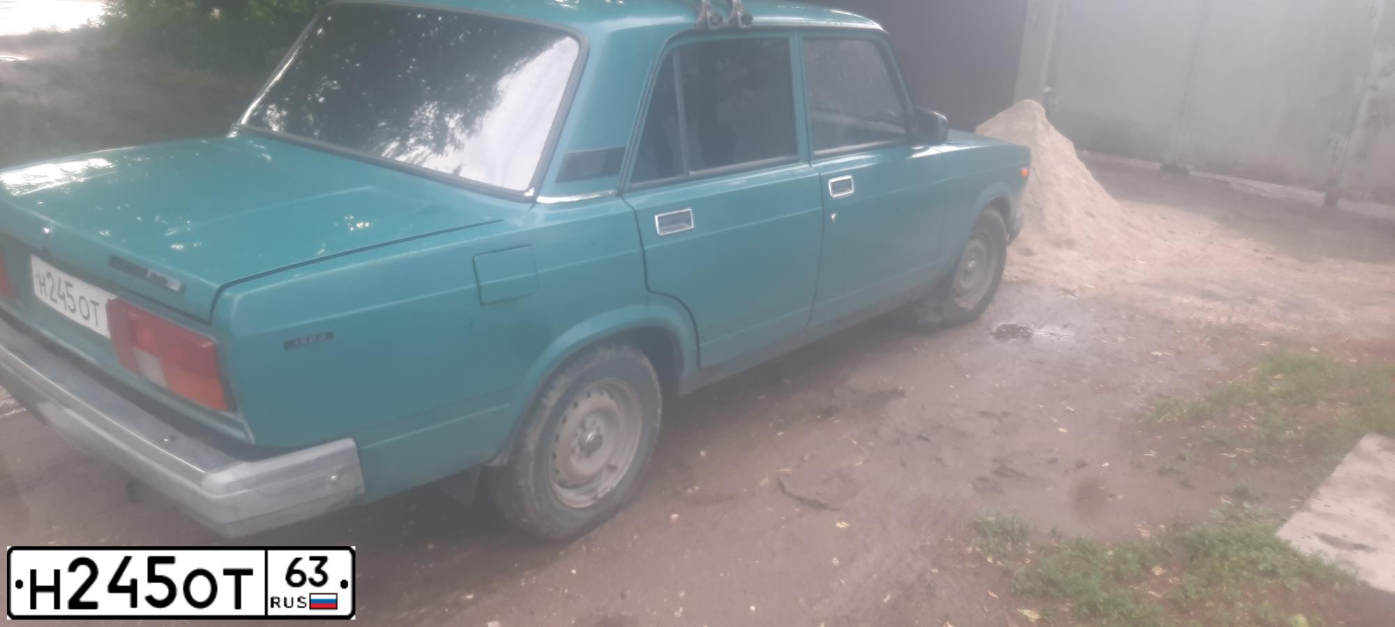 Фото автомобиля LADA 2110, 2005 — госномер Н245ОТ63. Цвет: средний серо-зеленый металлик