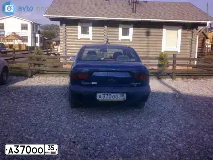 Фото автомобиля RENAULT MEGANE, 1998 — госномер А370ОО35. Цвет: ТЕМНО-СИНИЙ