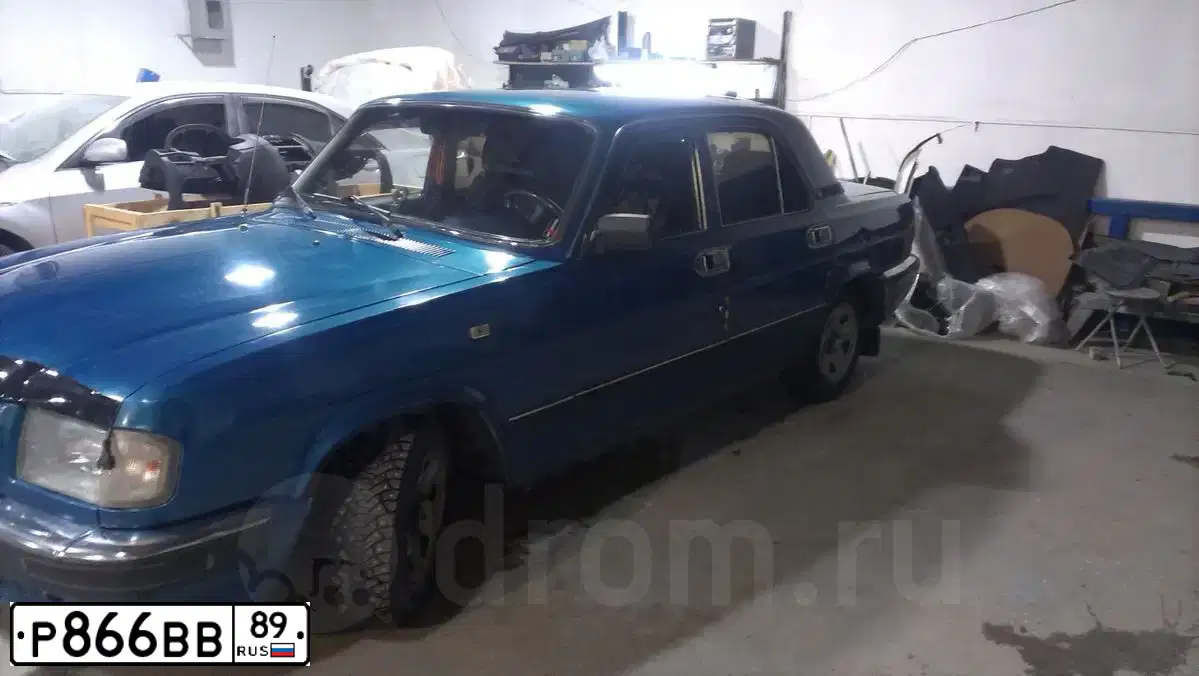 Фото автомобиля GAZ 3110, 2002 — госномер Н320КС21. Цвет: СОФИЯ