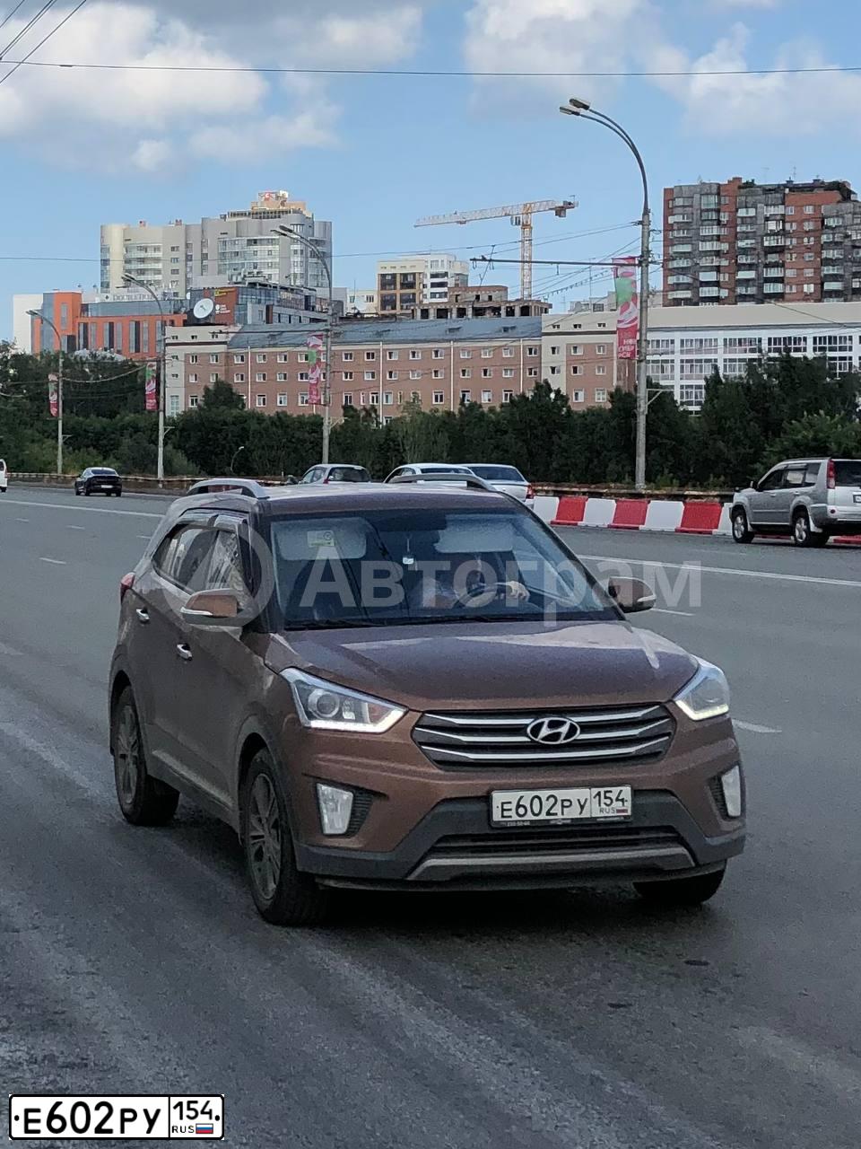 Фото автомобиля HYUNDAI CRETA, 2017 — госномер Е602РУ154. Цвет: Коричневый