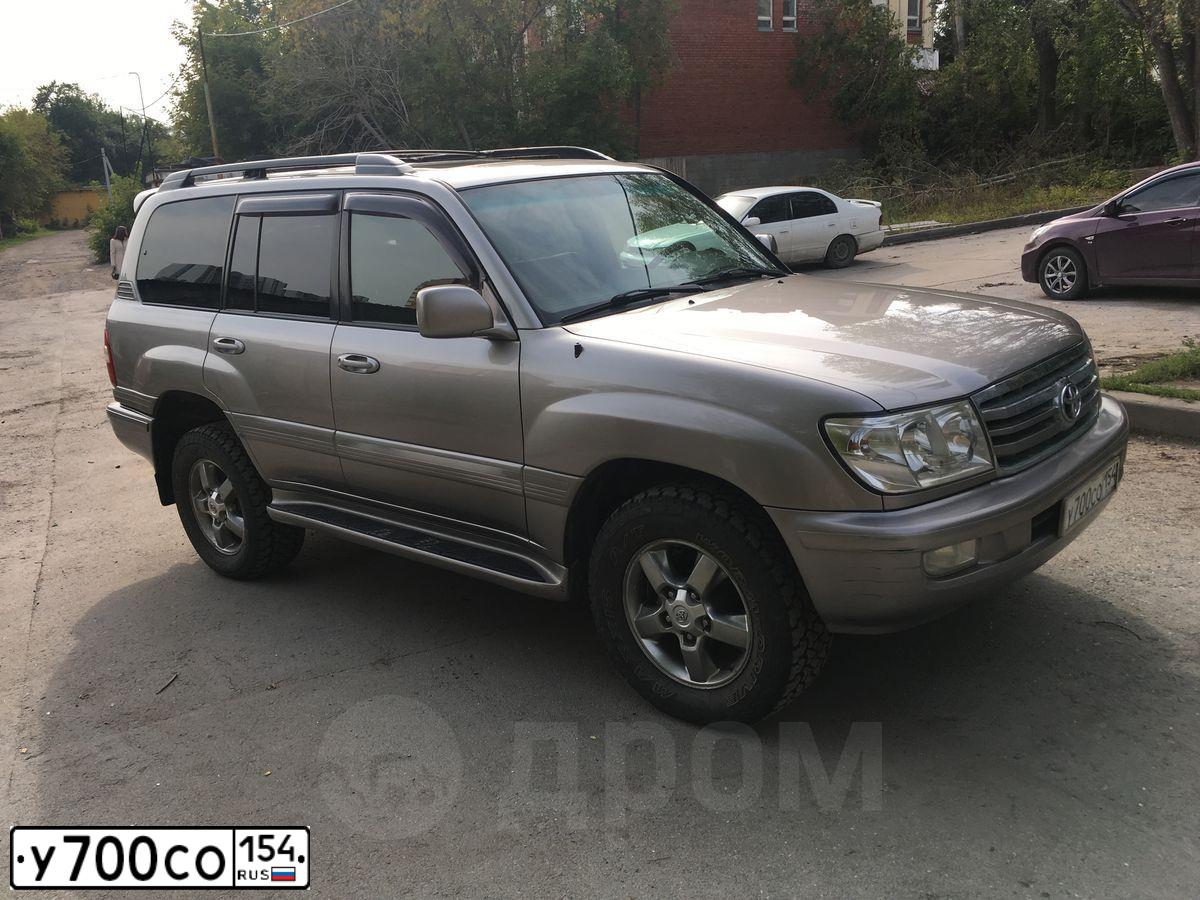 Фото автомобиля TOYOTA LANDCRUISER, 2005 — госномер У700СО154. Цвет: БЕЛЫЙ СЕРЫЙ