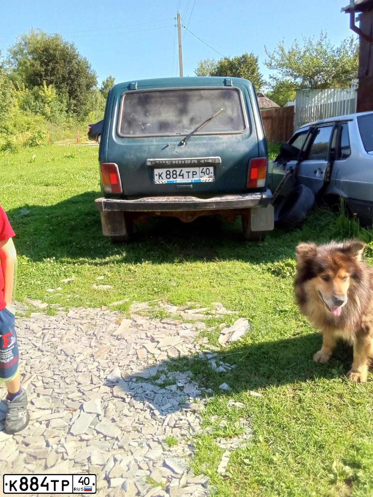 Фото автомобиля LADA 2121 NIVA, 1997 — госномер Р710УК40. Цвет: Темно-зеленый