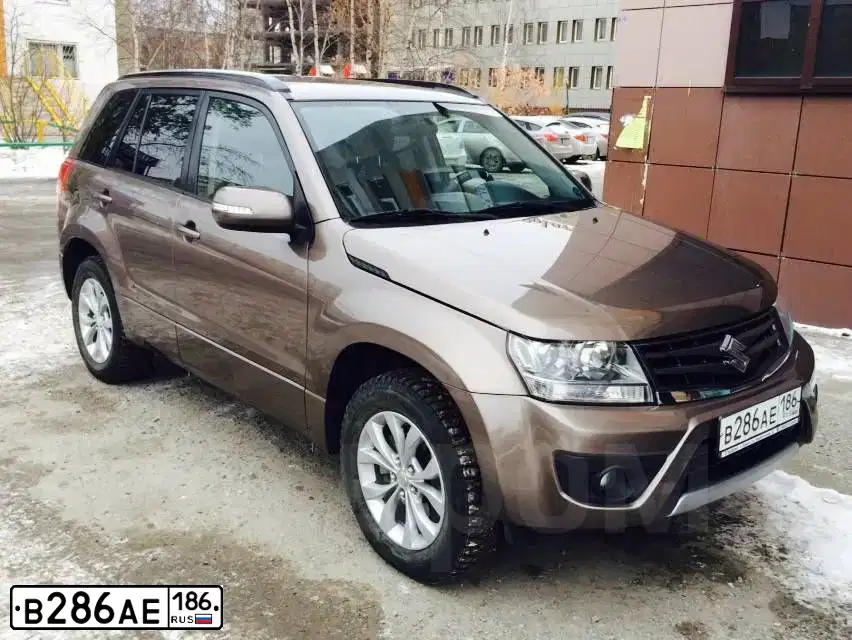 Фото автомобиля SUZUKI /GRAND/ VITARA, 2013 — госномер Р211ТО750. Цвет: БРОНЗОВЫЙ