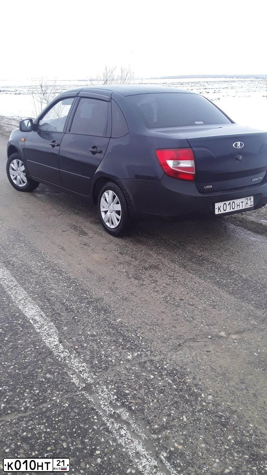 Фото автомобиля LADA 2190 GRANTA, 2013 — госномер К010НТ21. Цвет: синий