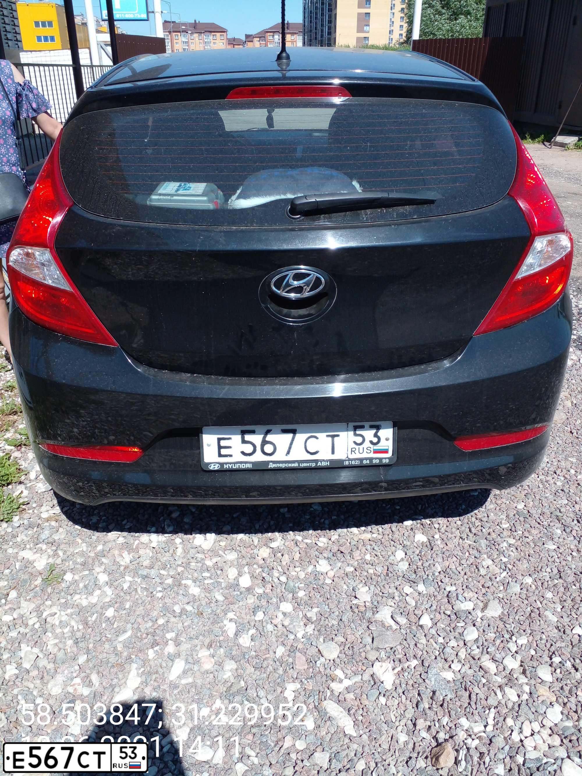 Фото автомобиля HYUNDAI SOLARIS, 2014 — госномер С062ТТ53. Цвет: ЧЕРНЫЙ