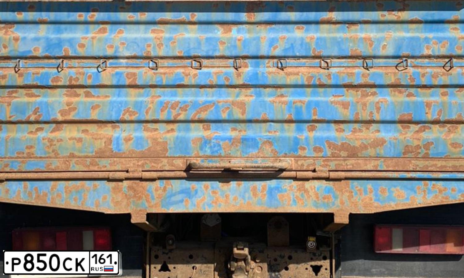 Фото автомобиля KAMAZ 65117 /6X4/, 2009 — госномер Р850СК161. Цвет: МЕДЕО