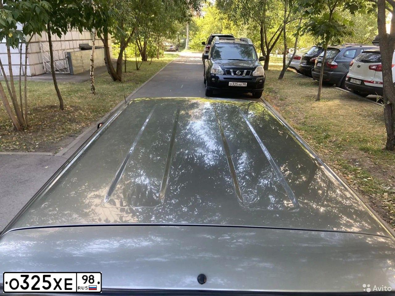 Фото автомобиля NISSAN X-TRAIL, 2010 — госномер О325ХЕ98. Цвет: ЧЕРНЫЙ
