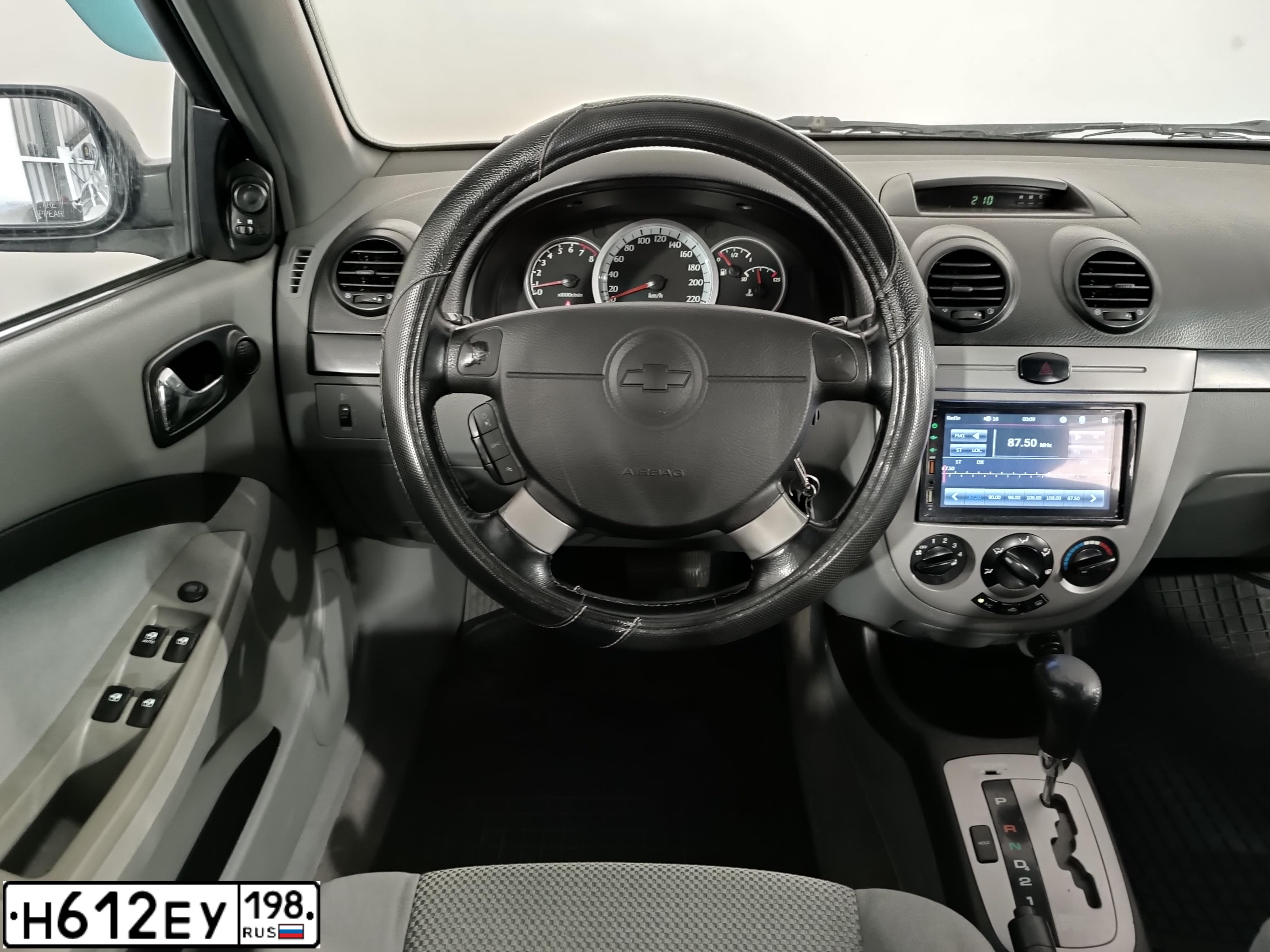 Фото автомобиля CHEVROLET LACETTI, 2007 — госномер К703МН53. Цвет: ЧЕРНЫЙ
