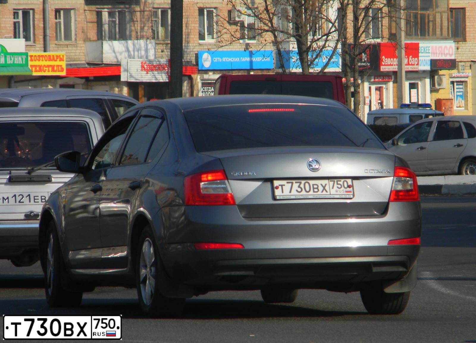 Фото автомобиля SKODA OCTAVIA, 2014 — госномер Н030РВ32. Цвет: ТЕМНО-СЕРЫЙ