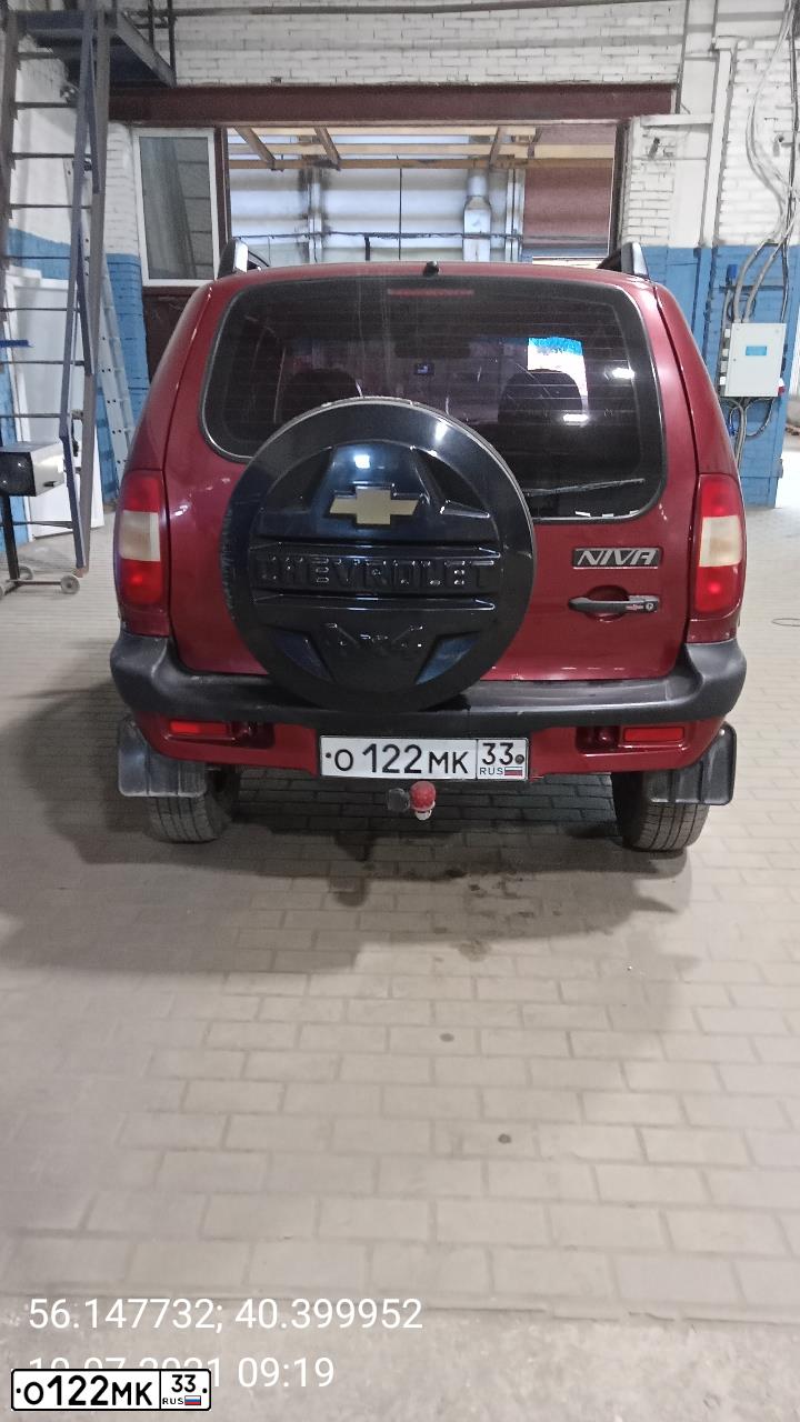 Фото автомобиля CHEVROLET T NIVA, 2007 — госномер О122МК33. Цвет: ЯРКО КРАСНЫЙ МЕТАЛЛИК