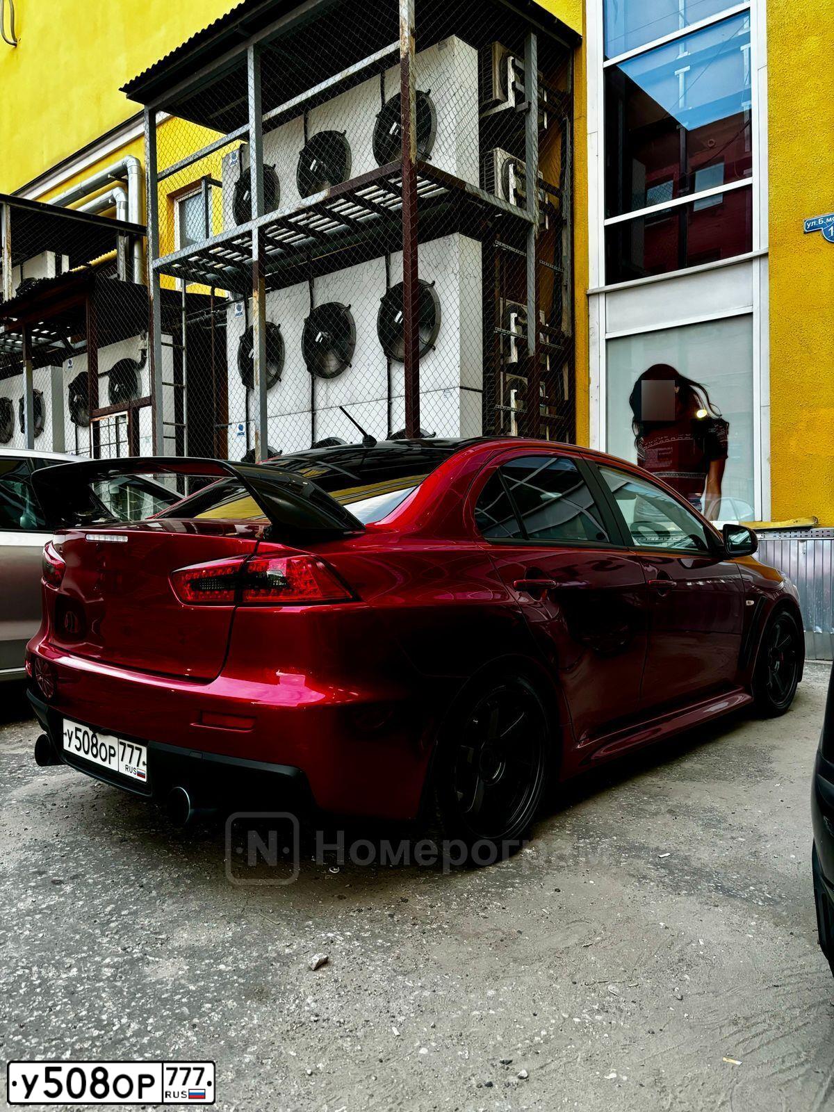 Фото автомобиля MITSUBISHI LANCER, 2008 — госномер У508ОР777. Цвет: Красный