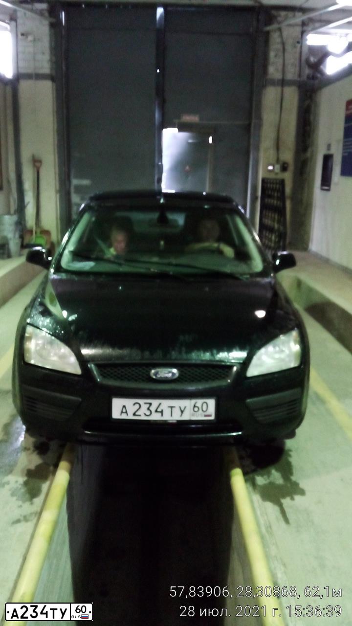 Фото автомобиля FORD FOCUS, 2006 — госномер А234ТУ60. Цвет: ЧЕРНЫЙ