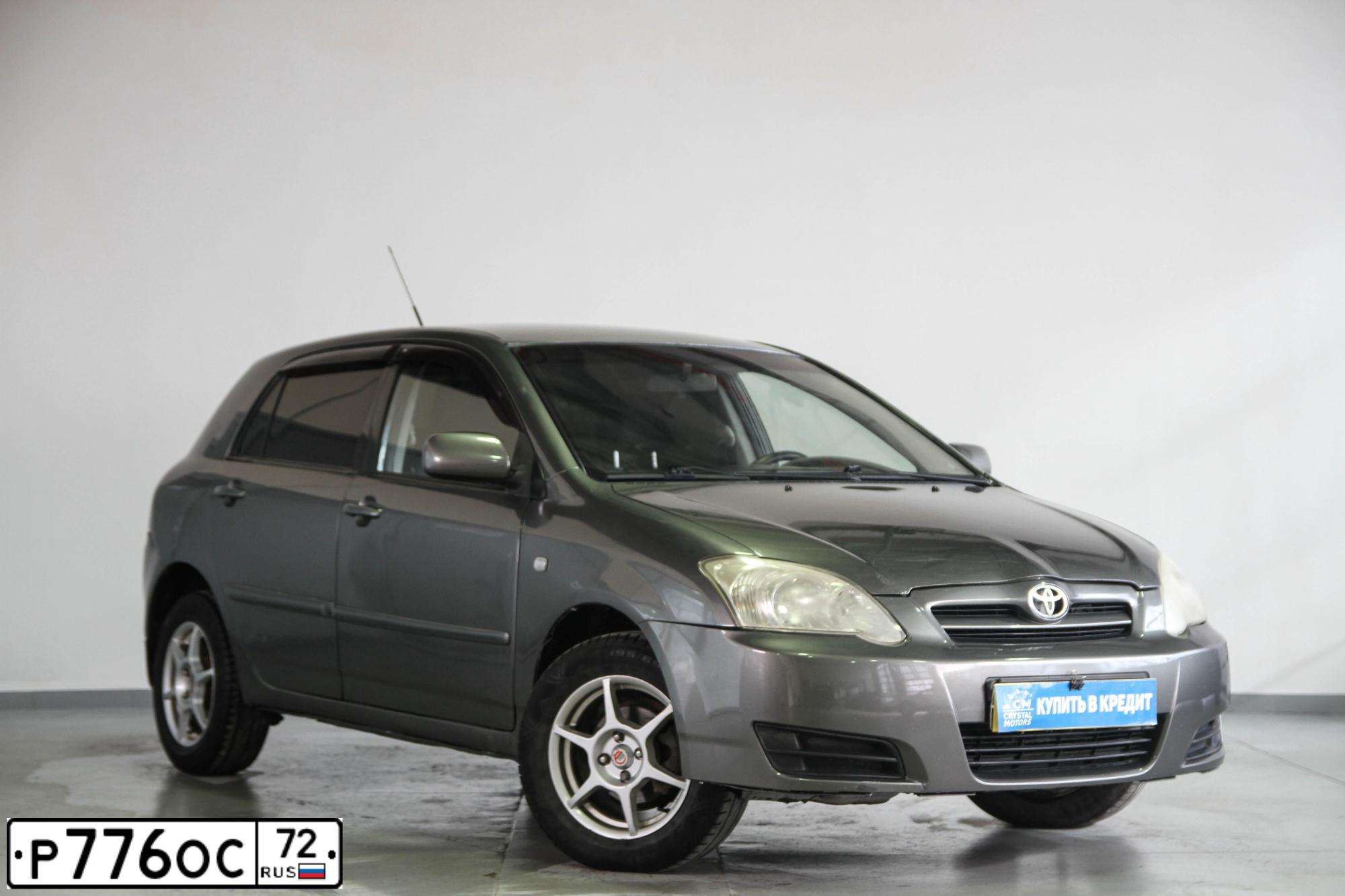 Фото автомобиля TOYOTA COROLLA, 2004 — госномер У699ОТ72. Цвет: Серый