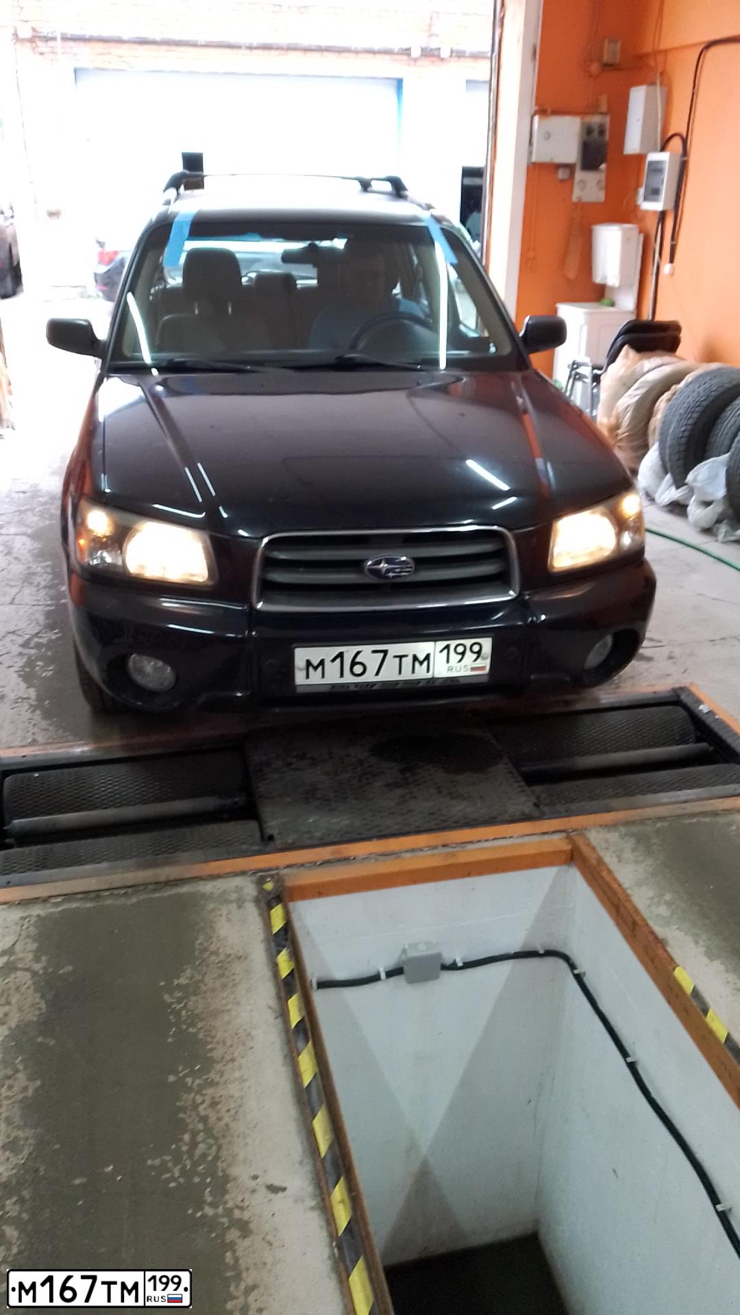 Фото автомобиля SUBARU FORESTER, 2005 — госномер М167ТМ199. Цвет: ЧЕРНЫЙ