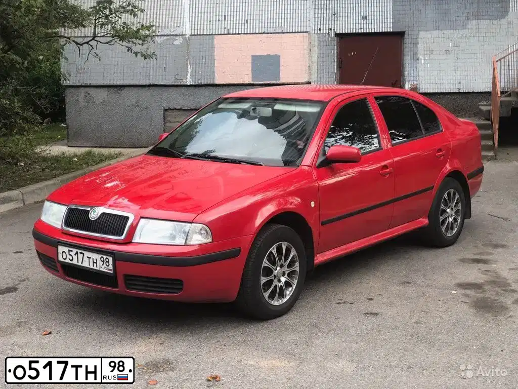 Фото автомобиля SKODA OCTAVIA, 2006 — госномер С661КУ60. Цвет: Красный