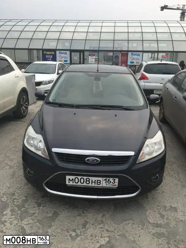 Фото автомобиля FORD FOCUS, 2008 — госномер М008АТ21. Цвет: ТЕМНО-СЕРЫЙ