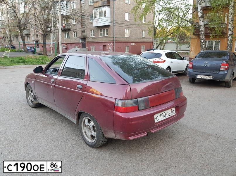 Фото автомобиля LADA 2112, 2005 — госномер В092КА702. Цвет: ТЕМНО-МАЛИНОВЫЙ