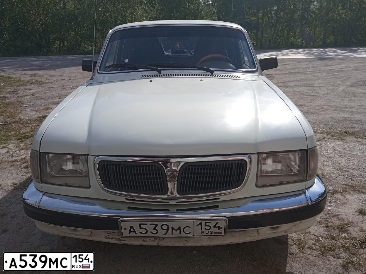 Фото автомобиля GAZ 3110 WOLGA, 2001 — госномер Р883ОУ154. Цвет: БЕЛЫЙ