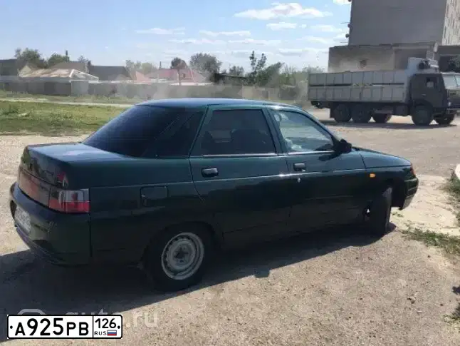 Фото автомобиля LADA 2110, 2003 — госномер Т034НМ05. Цвет: Темно-зеленый