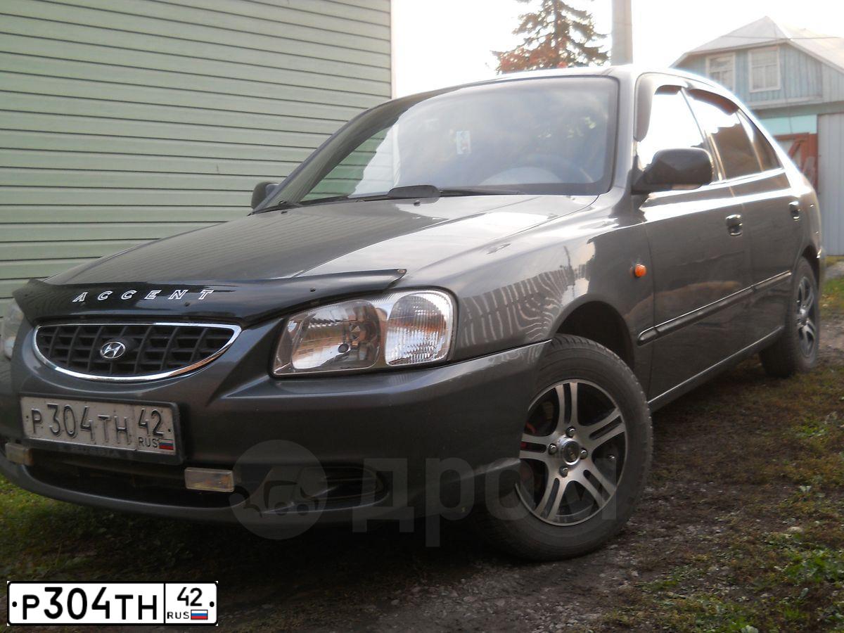 Фото автомобиля TAGAZ ACCENT, 2005 — госномер А220АВ790. Цвет: Серый