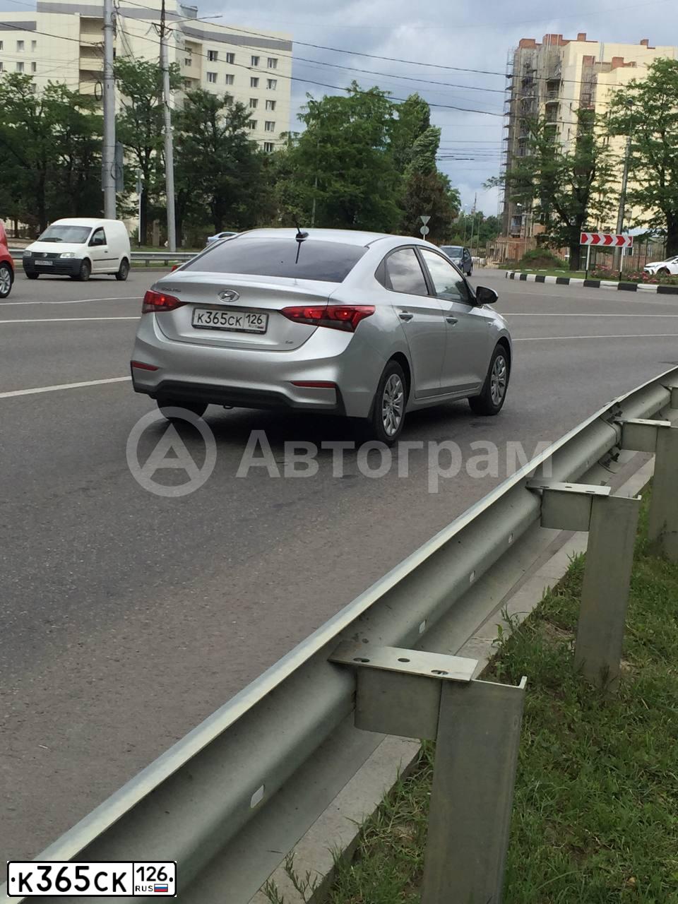 Фото автомобиля HYUNDAI SOLARIS, 2018 — госномер М013ОС126. Цвет: СЕРЫЙ