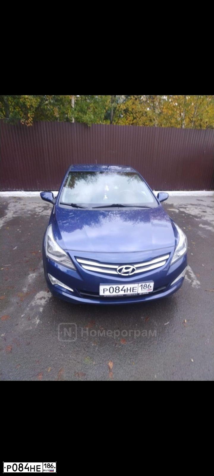 Фото автомобиля HYUNDAI SOLARIS, 2016 — госномер Р084НЕ186. Цвет: синий