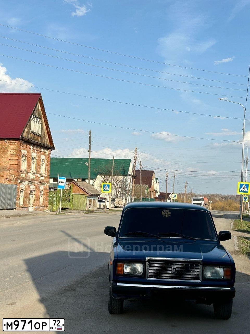 Фото автомобиля LADA 2107, 2002 — госномер М971ОР72. Цвет: СИНЕ-ЗЕЛЕНЫЙ