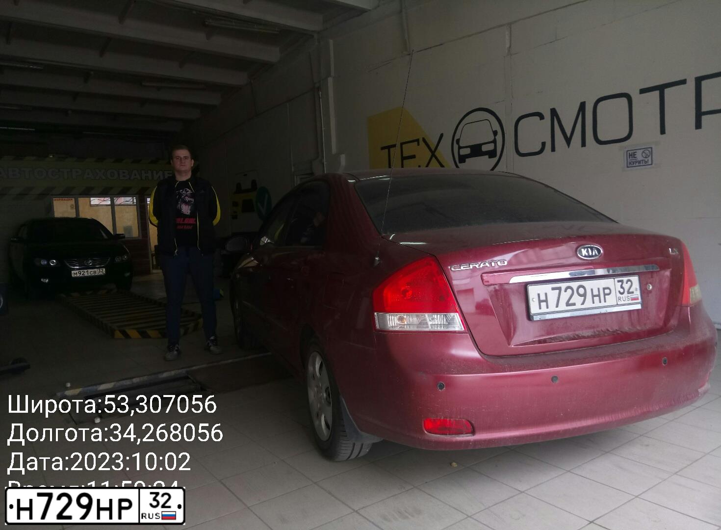 Фото автомобиля KIA CERATO, 2006 — госномер Н729НР32. Цвет: СПЕЛАЯ ВИШНЯ